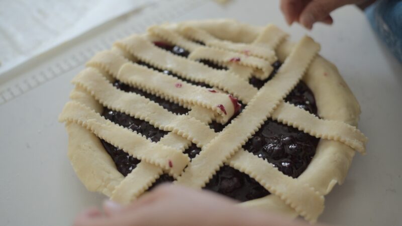 Top pie crust strips are prepared for lattice work.