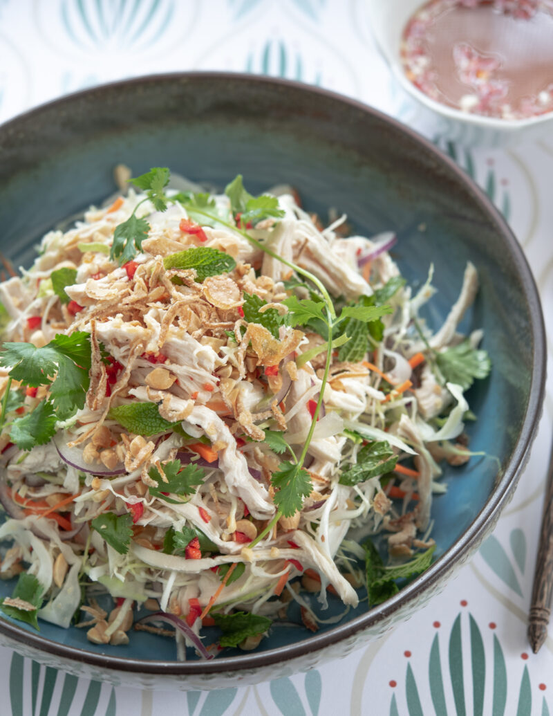 Shredded chicken, fresh herbs, and roasted peanuts makes a great Vietnamese chicken salad.