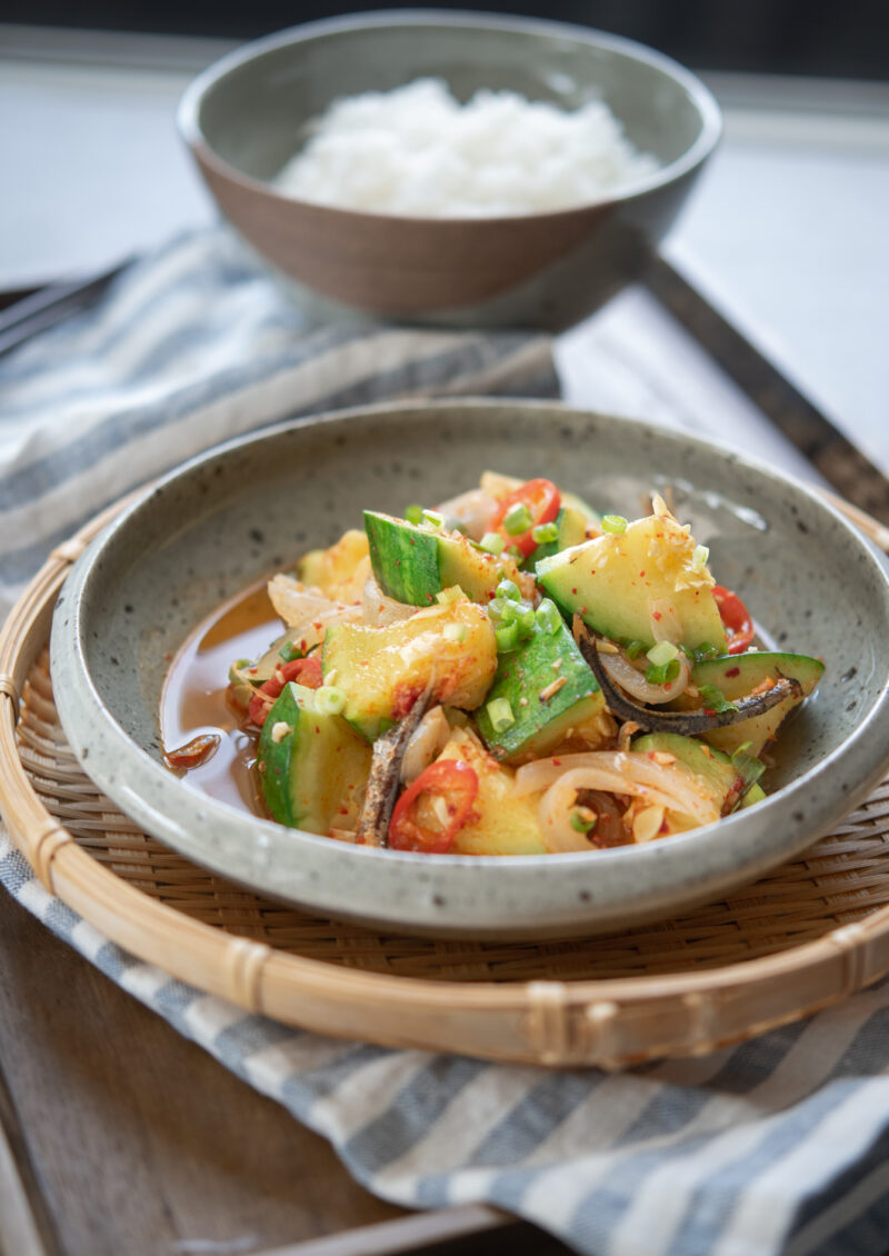 Korean round zucchini banchan made with anchovy is served as side dish with rice.