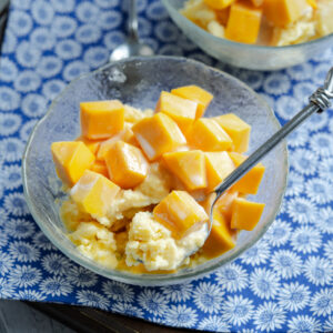 Homemade mango shaved ice (bingsu) is made in a blender and topped with fresh mango