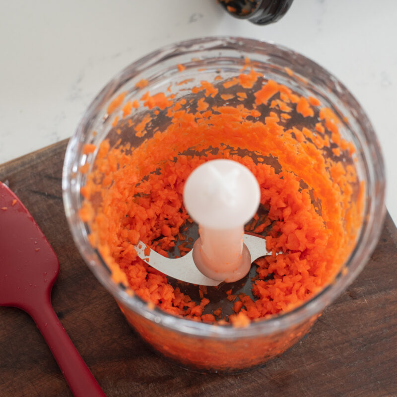 Carrot is finely minced in a food processor.