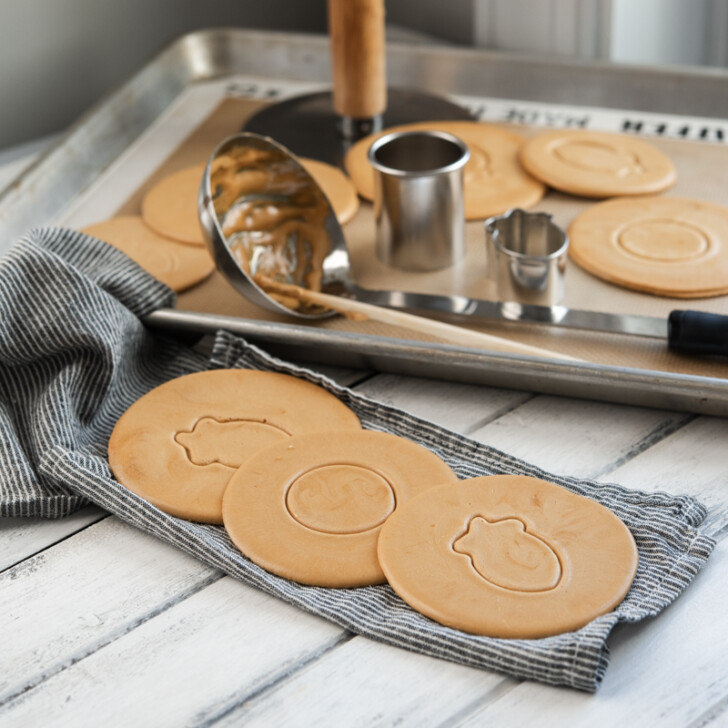 Korean Dalgona candies are pressed with cookie cutters