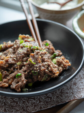 Tender Korean beef bulgogi is marinaded in savory sauce and cooked to a perfection