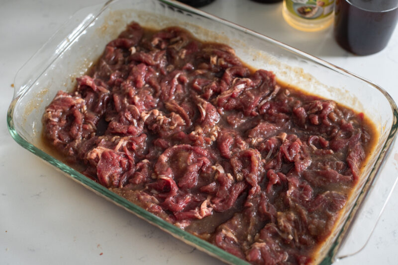 Thinly sliced Korean beef in Bulgogi marinade.