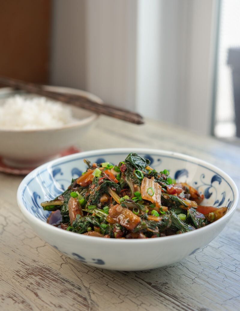 Fuchsia Dunlop’s Swiss chard stir-fry is served with rice.