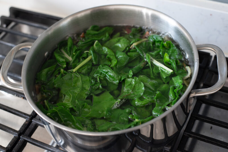 Blanching Swiss chard in a boiling water help remove bitter taste.
