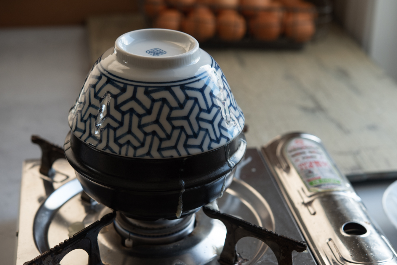 A domed bowl covering a small pot to steam gyeran jjim for a fluffy, soufflé-like finish.