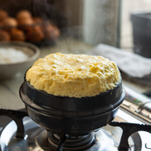 This steaming hot volcanic Korean egg is cooked in a stone pot.