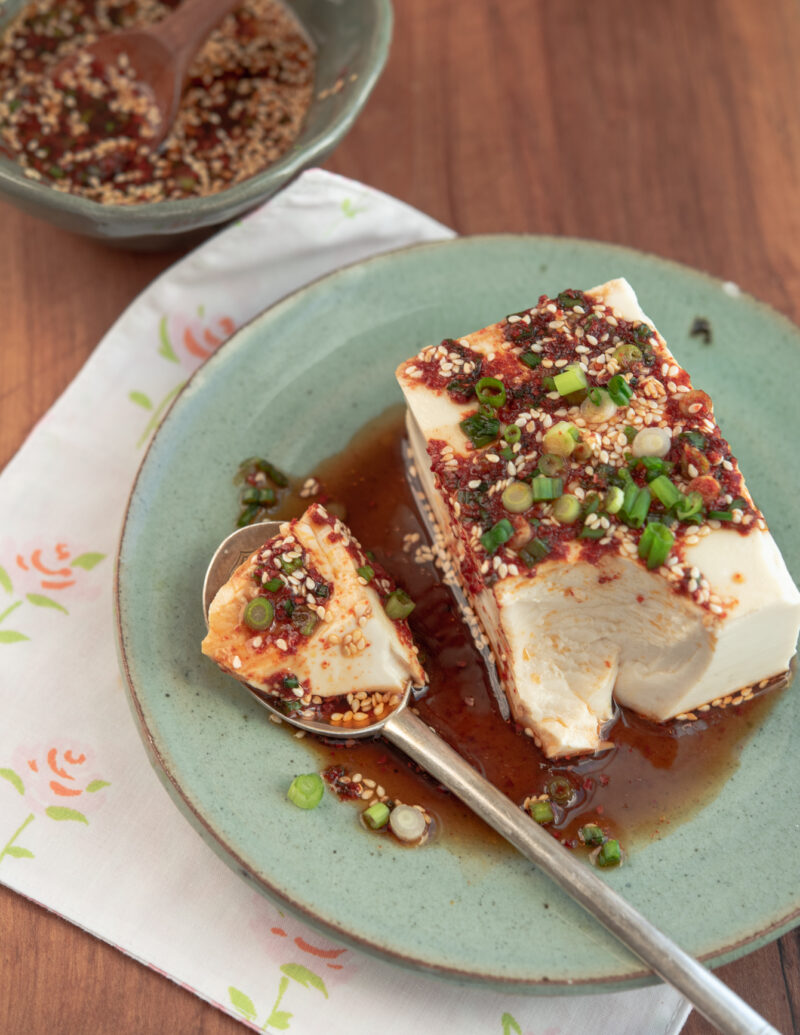 Streamed silken tofu with Korean soy chili sauce is easy to spoon up