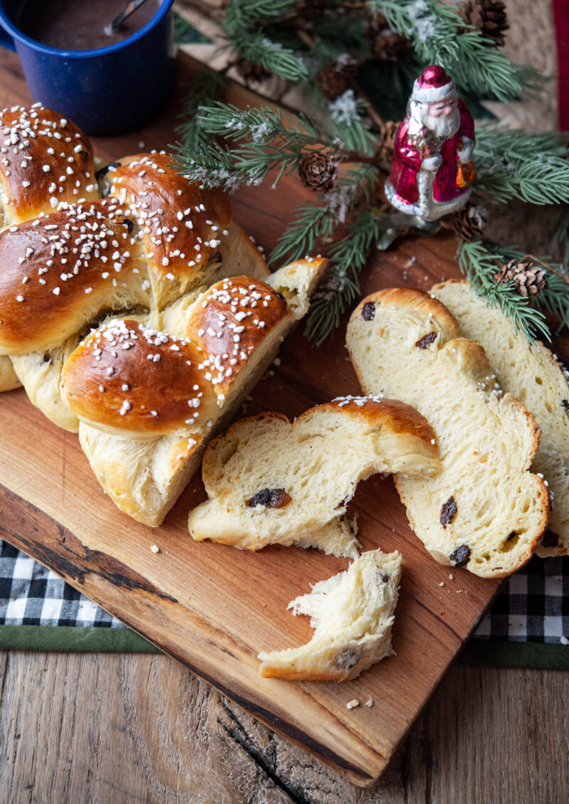 Slices of traditional Pulla loaf with raisin are showing a tender and fluffy texture.