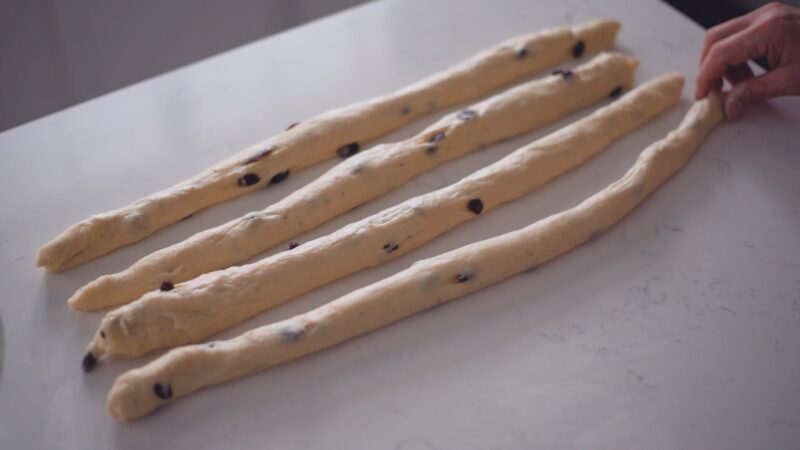 4 strips of pulla dough before braiding.