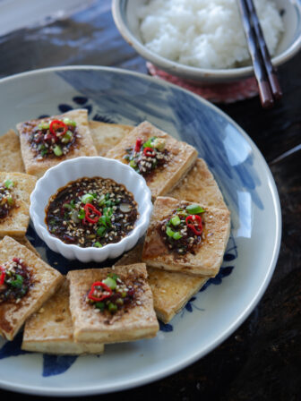 This crisp Korean pan seared tofu is best served with soy chili sauce