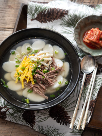 This traditional Korean rice cake soup is topped with shredded beef, egg garnish in clear beef broth