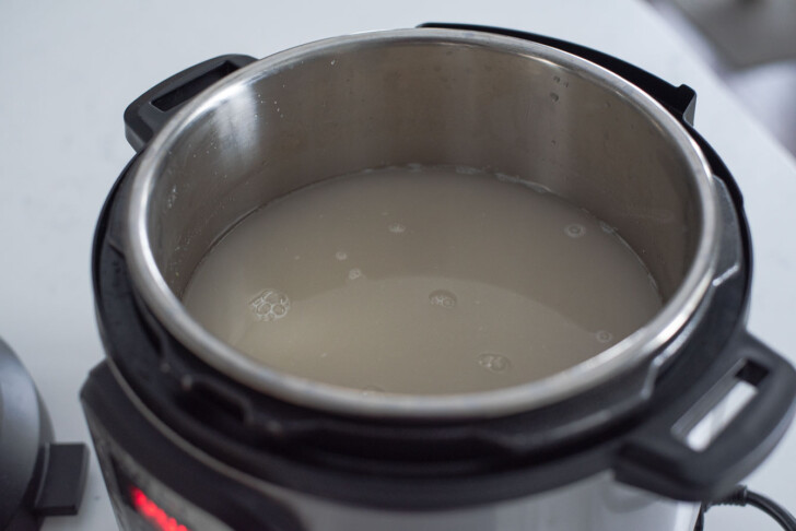 Barely malt water added to the rice in an instant pot to make sikhye (Korean rice punch).