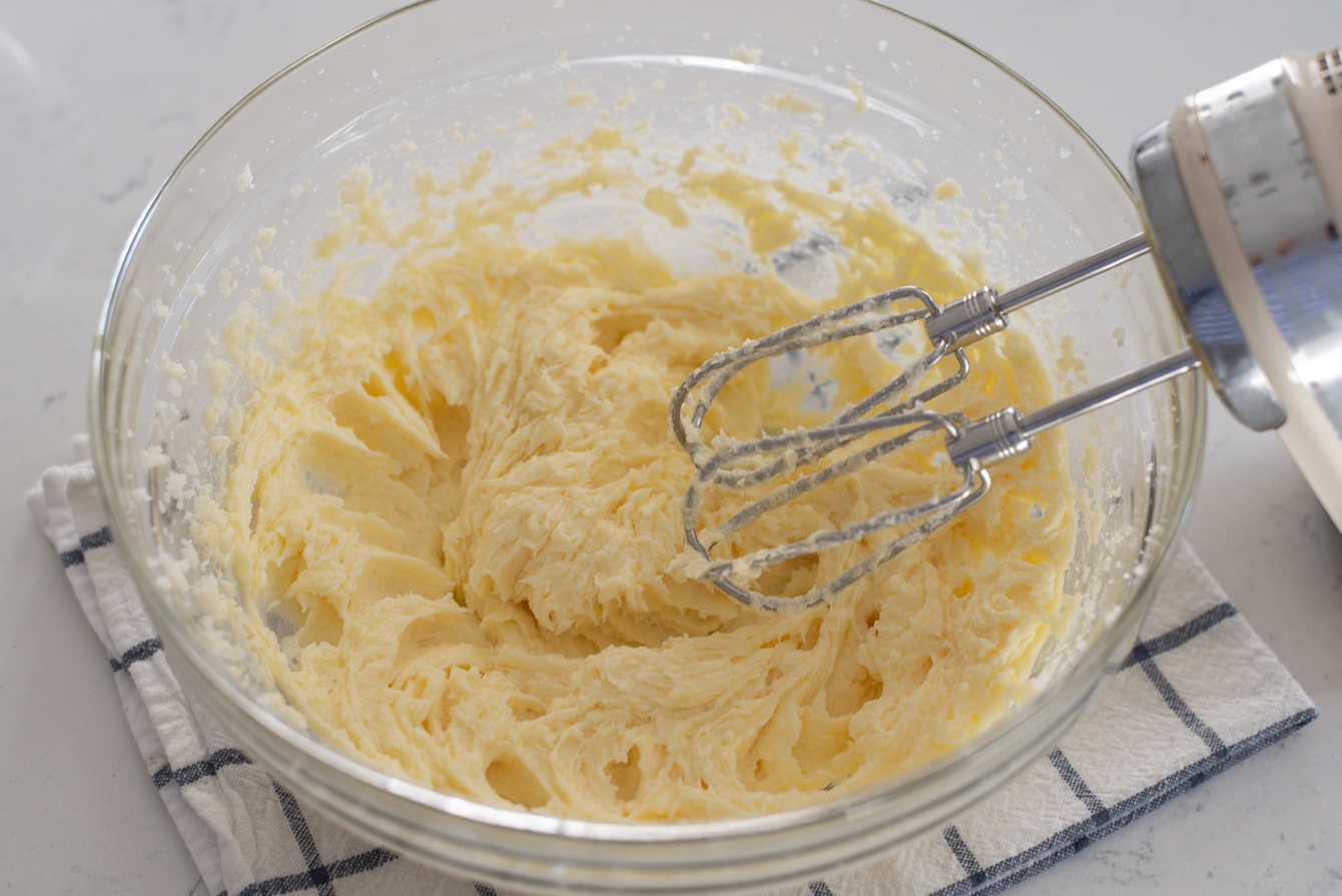 Butter, sugar, and eggs are beaten together until creamy