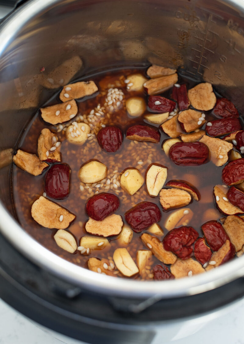 Korean sweet rice, chestnu and dried jujube are combined with jujube stock in an instant pot