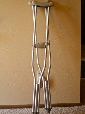 a pair of crutch is leaning on the wall