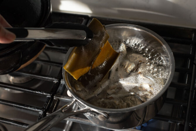 anchovy and sea kelp simmering to make anchovy stock.