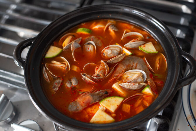 A spicy Korean tofu stew in a pot.