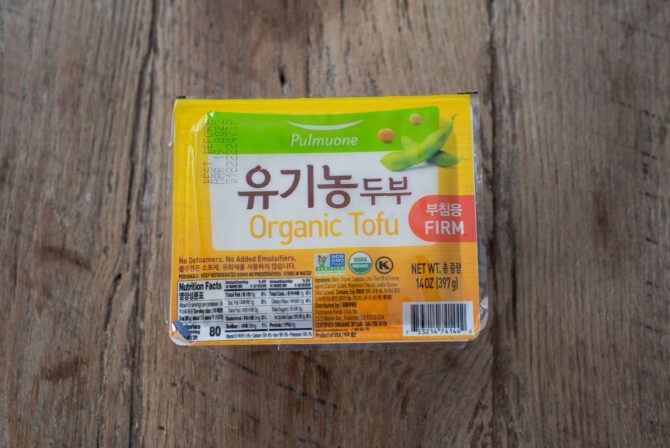 Korean firm tofu is in the water-filled plastic package.