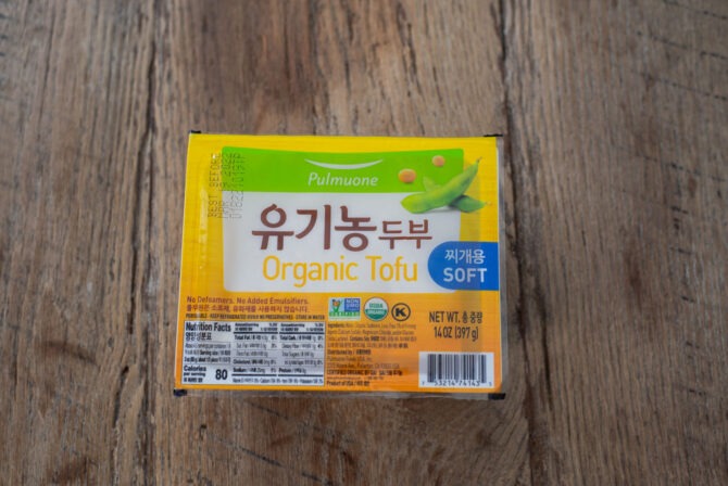 Korean style soft tofu is inside the sealed plastic container