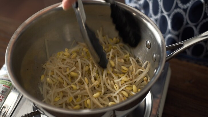 Soybean sprouts steaming in a pot