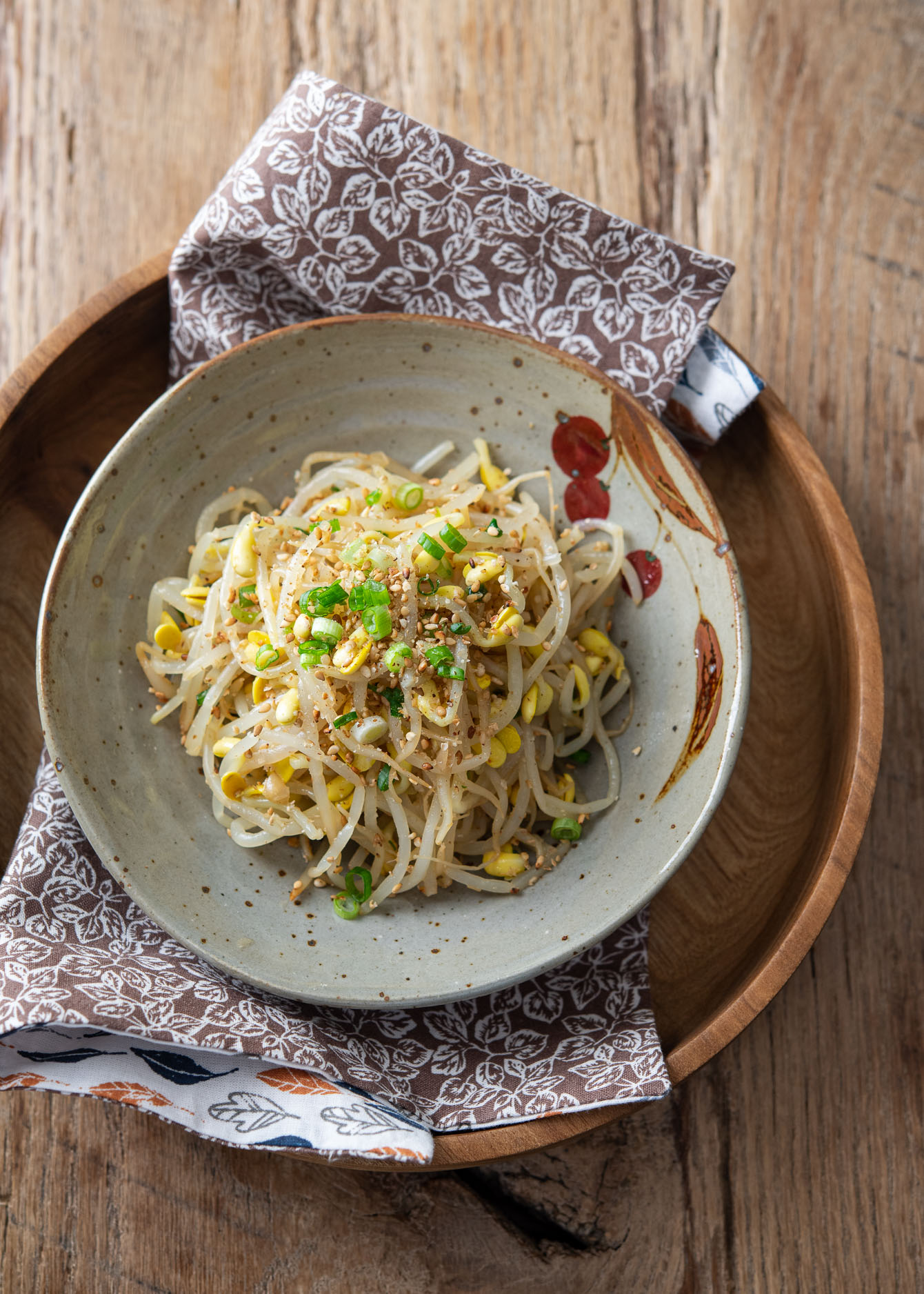 Korean bean sprout salad garnished with sesame seeds.