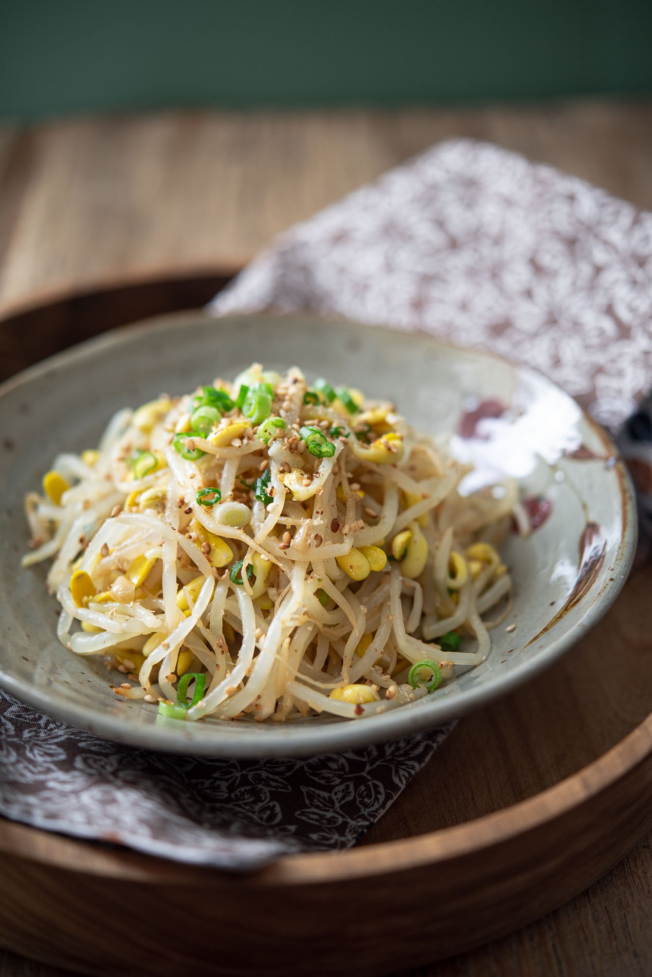 Bean sprout salad made with Korean soybean sprouts in a servnig dish.