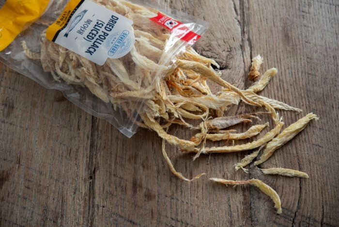 Dried shredded pollock pieces are out of package