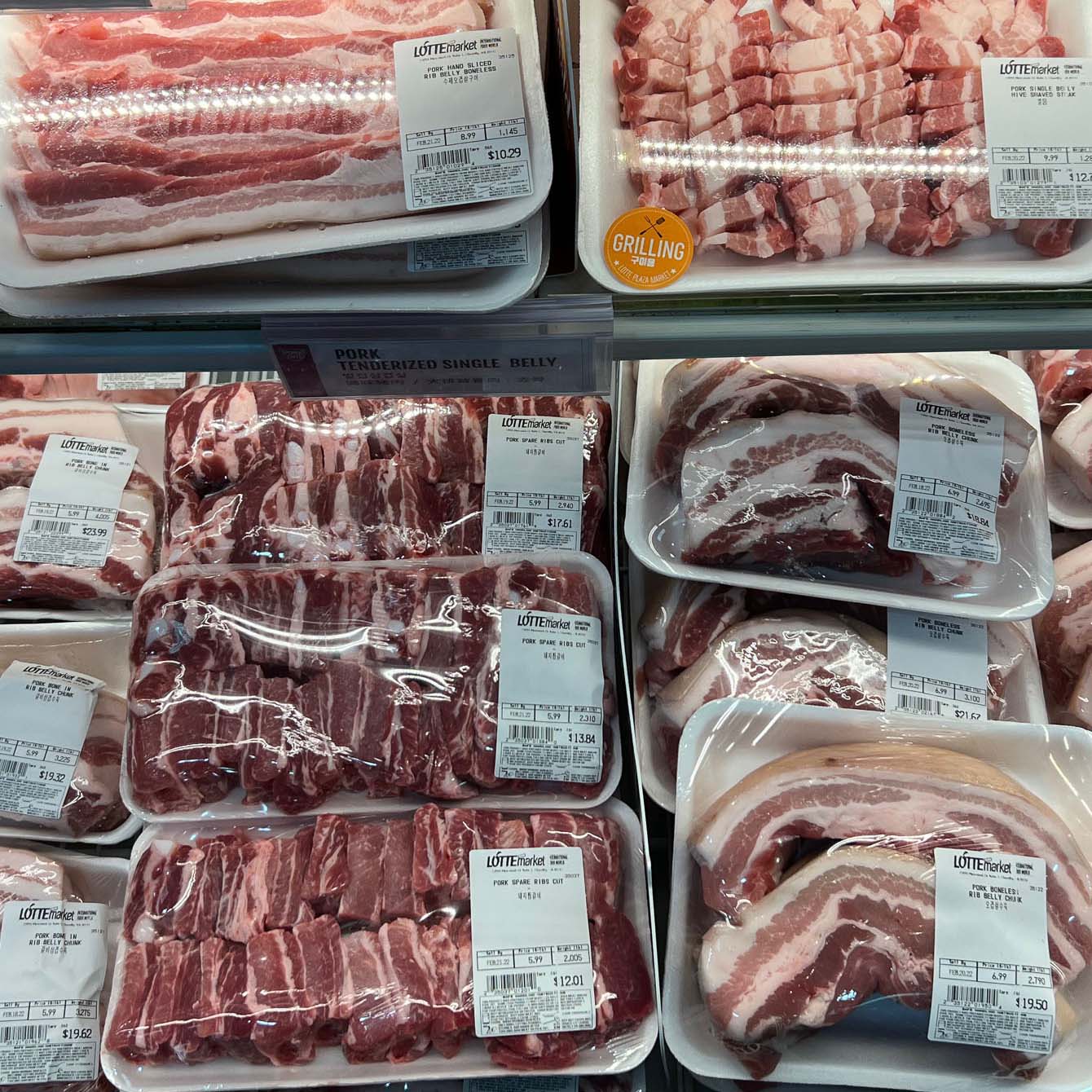 Korean style pork belly and pork short ribs are displayed on the shelf