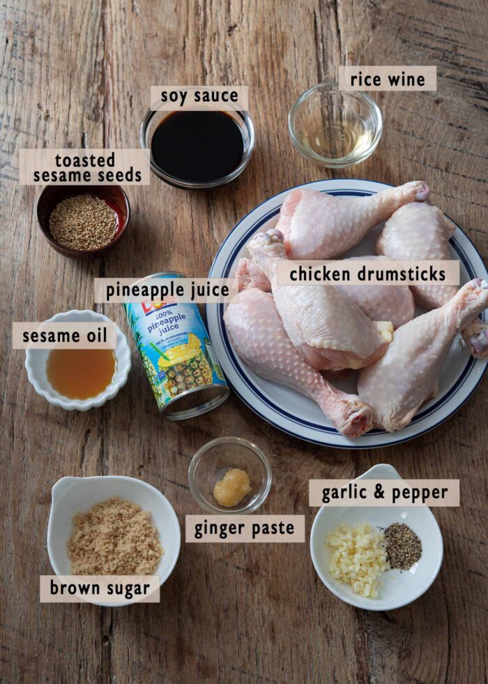 Ingredients used for making Teriyaki chicken is placed on a wooden counter.