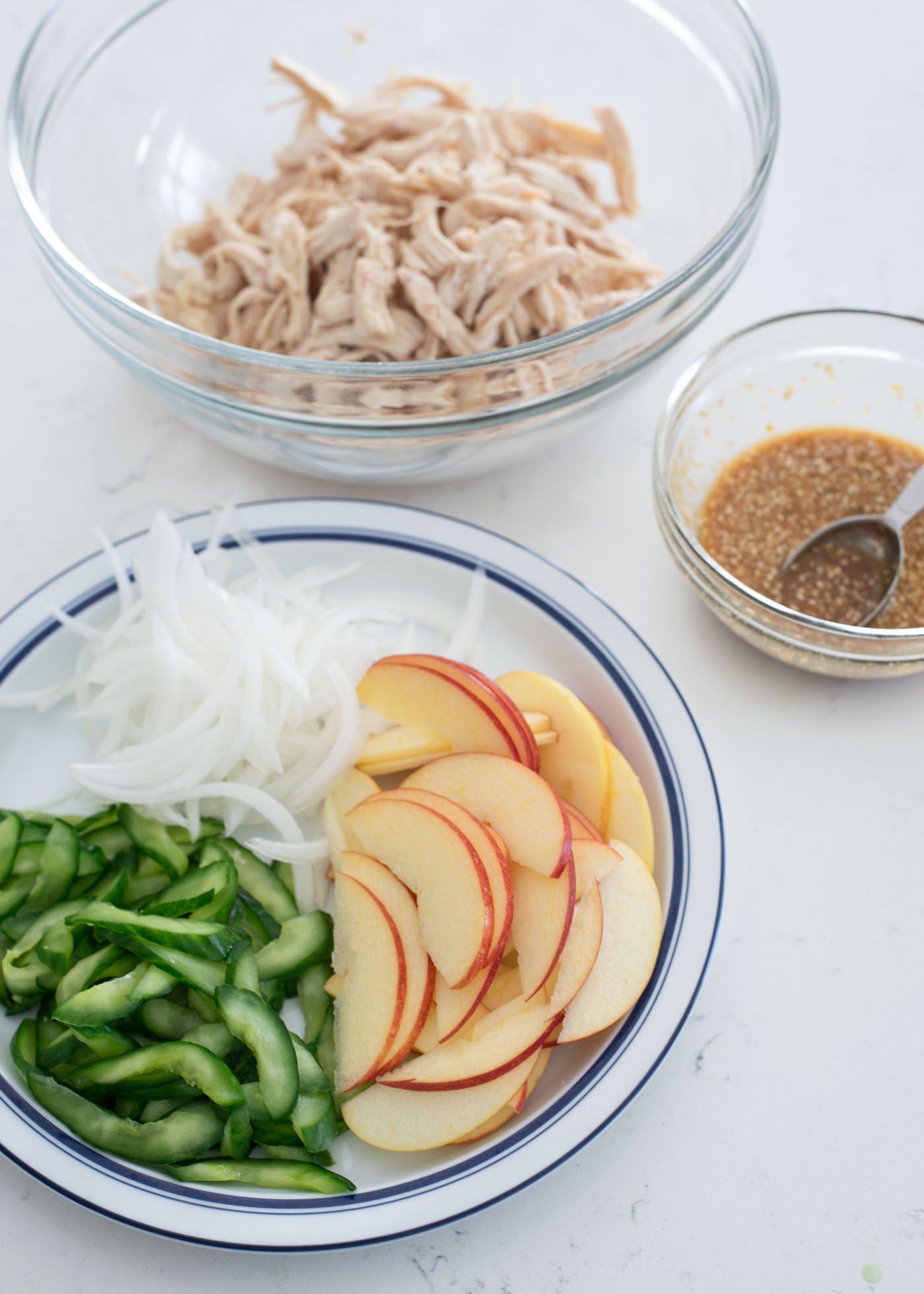 Ingredients for Korean chicken salad and the dressing are gathered up.