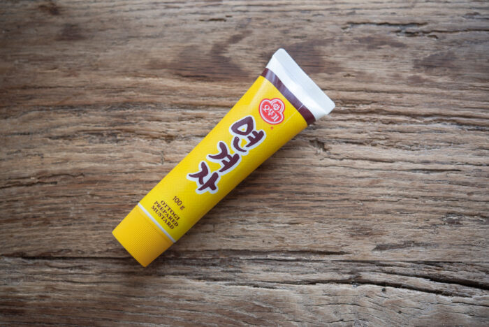 A yellow tube of Korean mustard is shown.