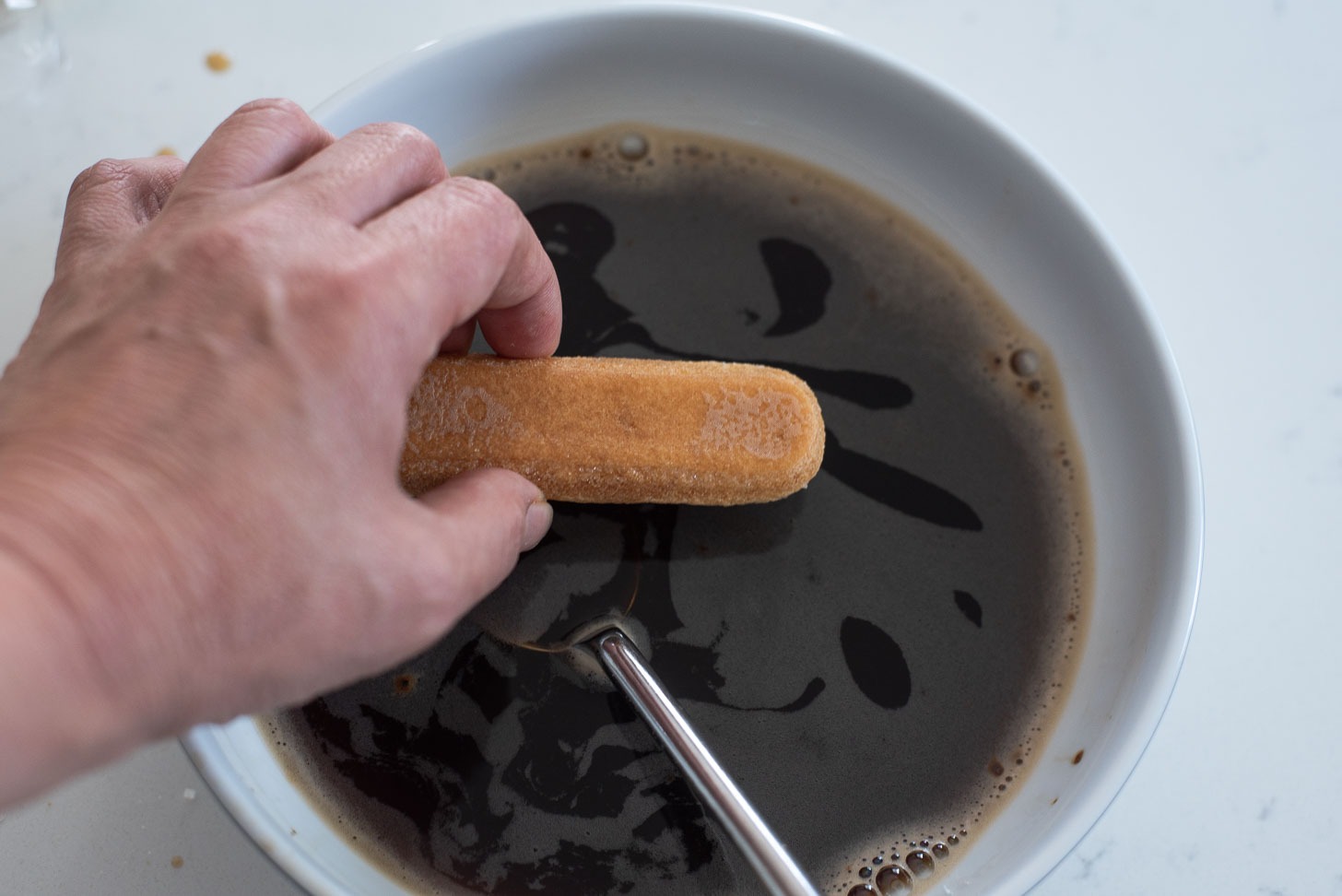 Dip ladyfinger cookies into barley coffee for making caffein free tiramisu.