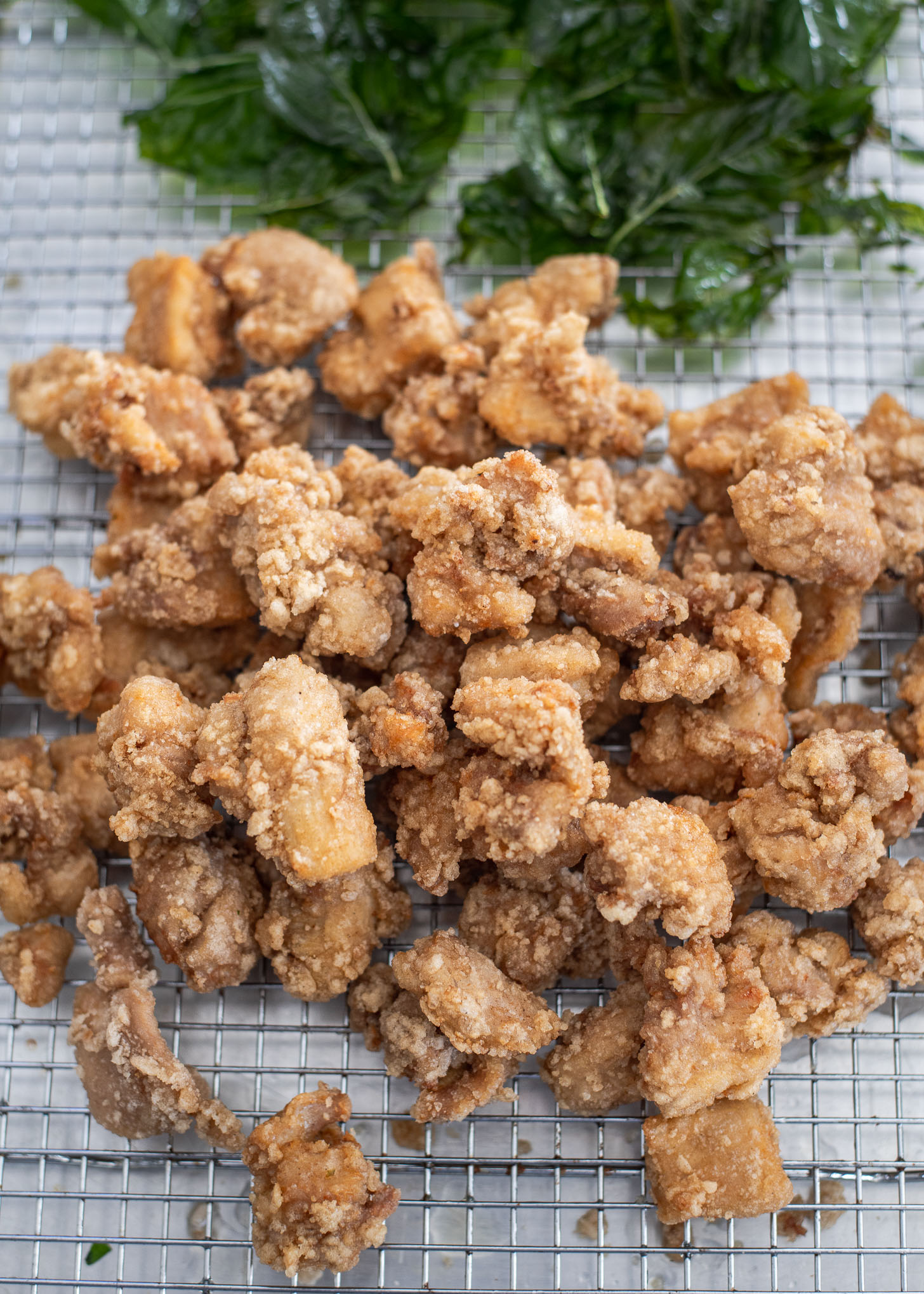 Double deep-fried and golden brown chicken pieces showing crunchy texture.