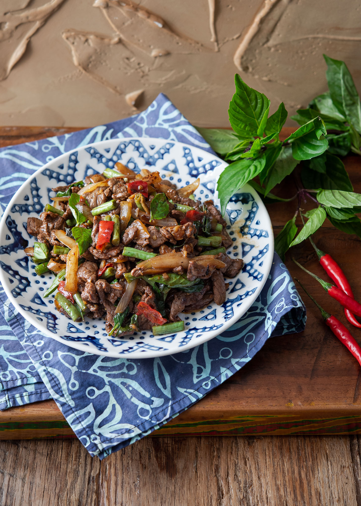 Thai basil beef stir fry (Pad Gra Prow) served in a plate.