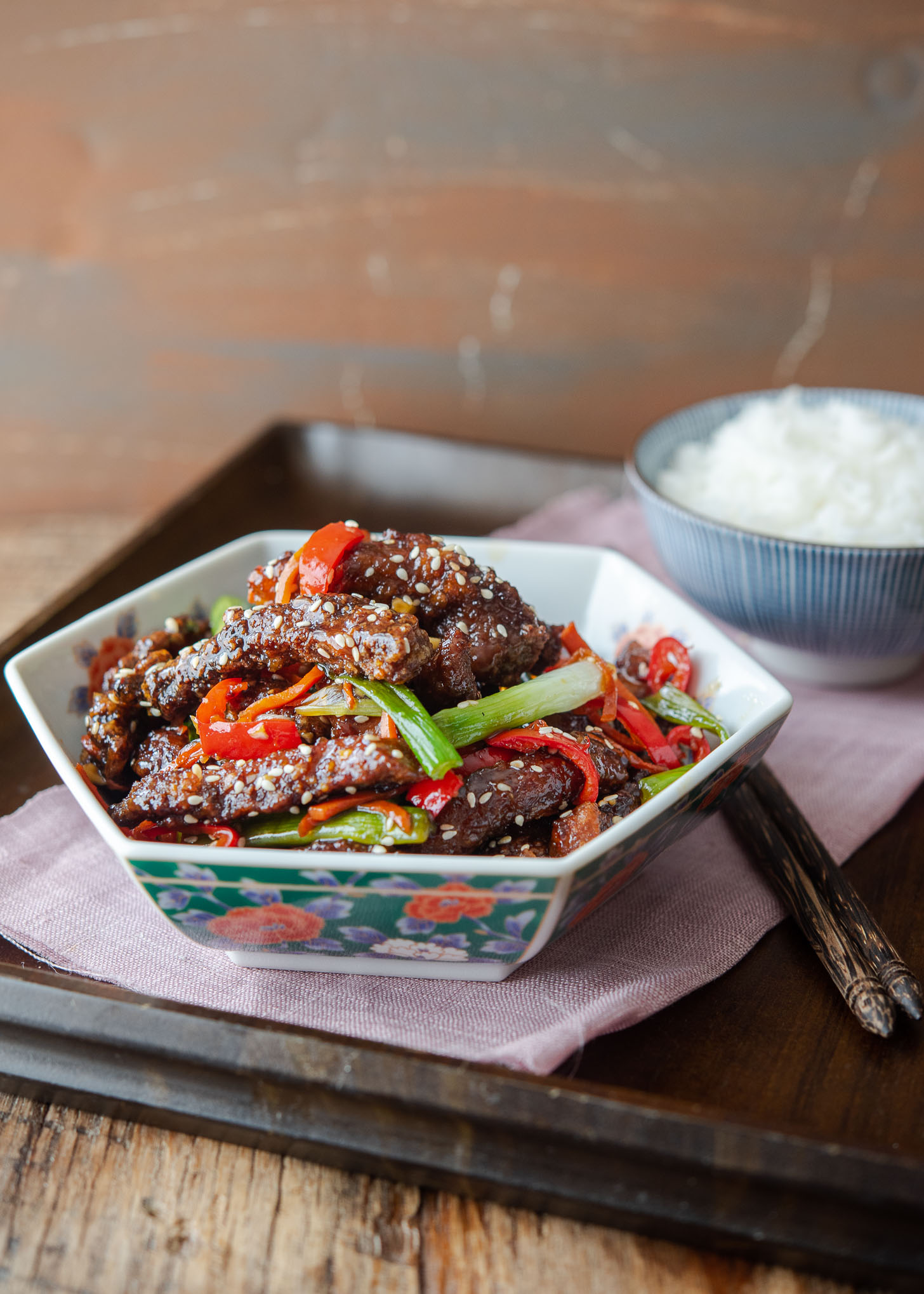 Sticky Chinese crispy chili beef served with rice.