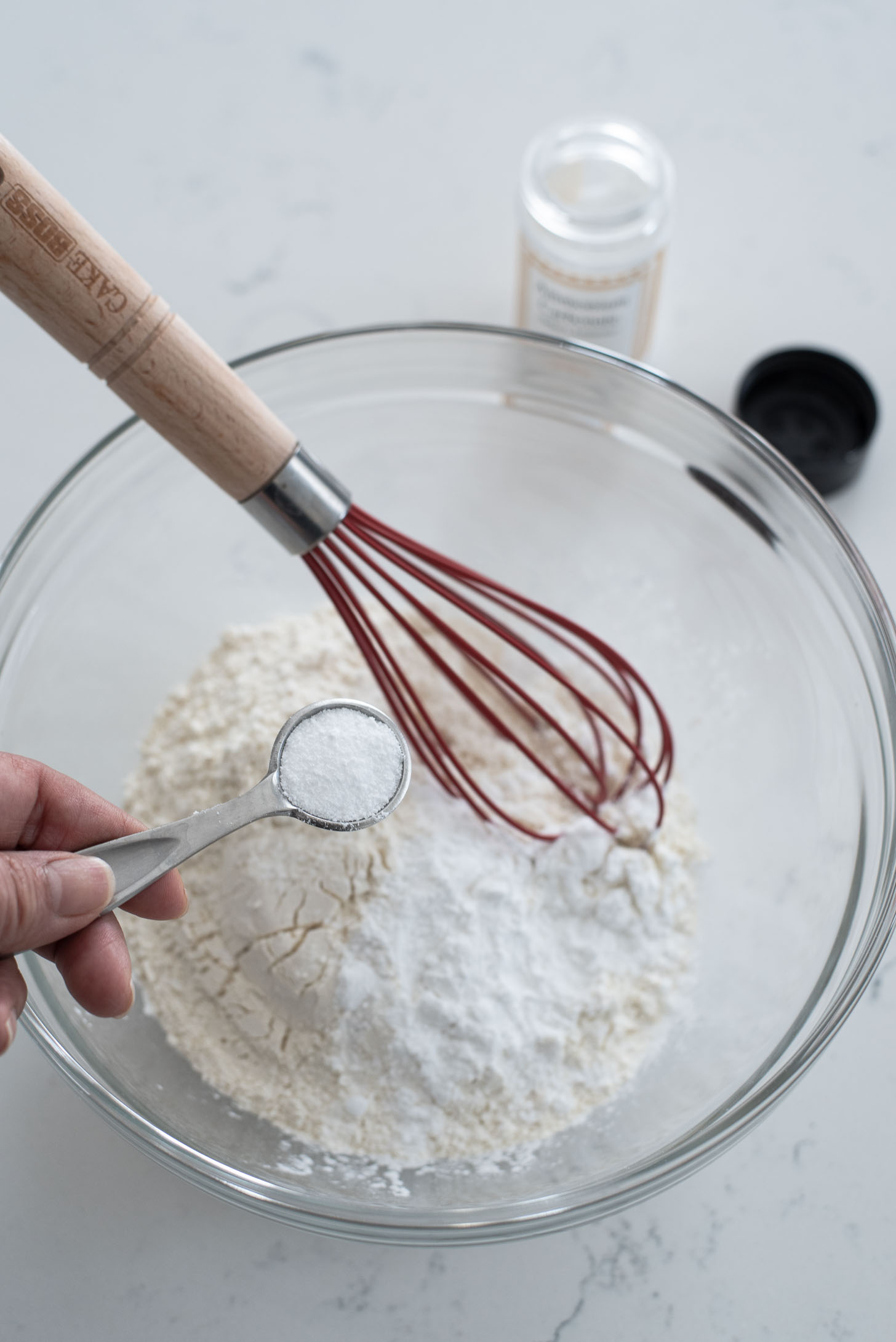 Dry ingredients for making Swedish dream cookies are combined in a bowl.