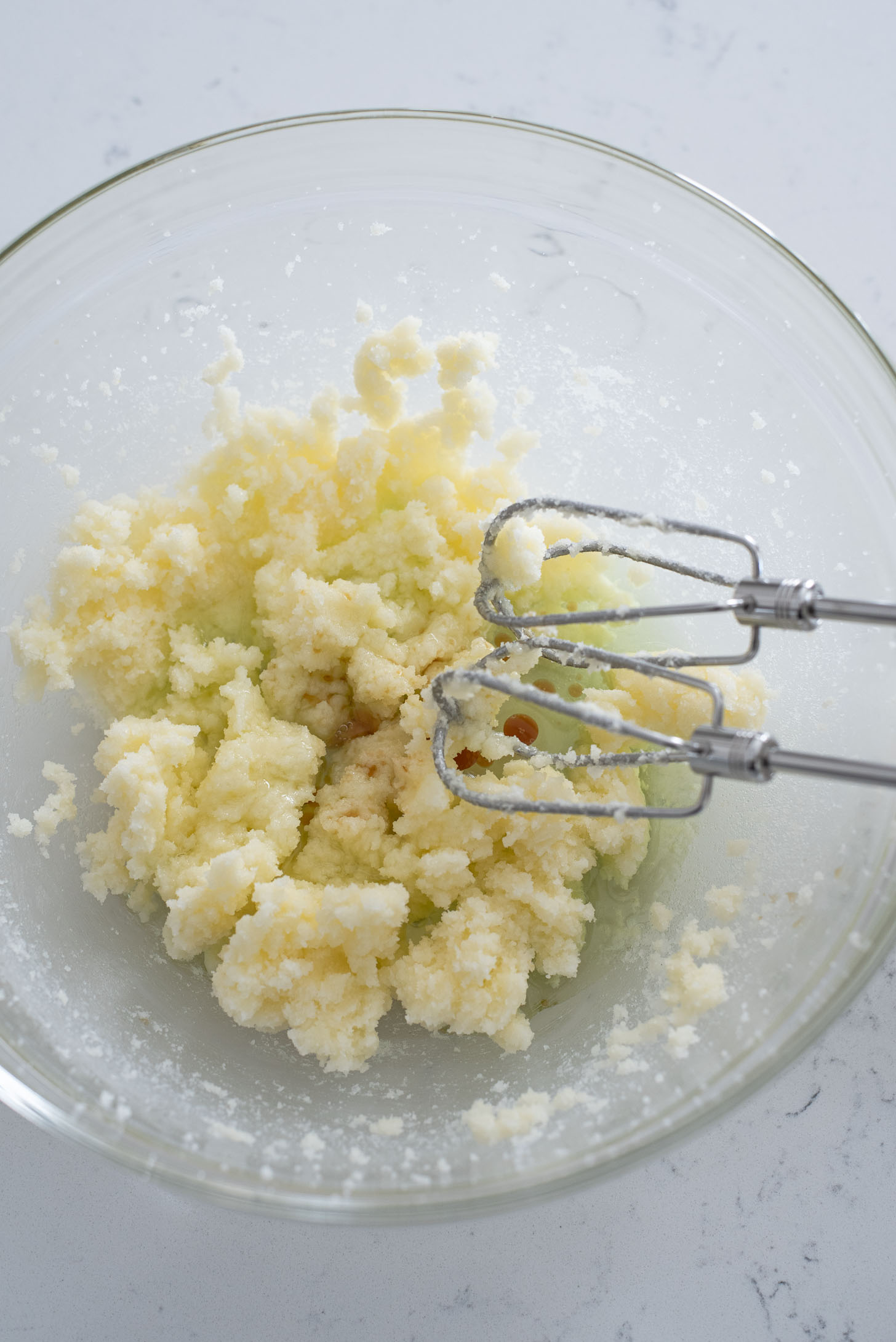 Butter and oil is mixed together in a bowl.