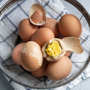 Korean sauna eggs are showing the nutty brown color on the egg whites and rich egg yolks.