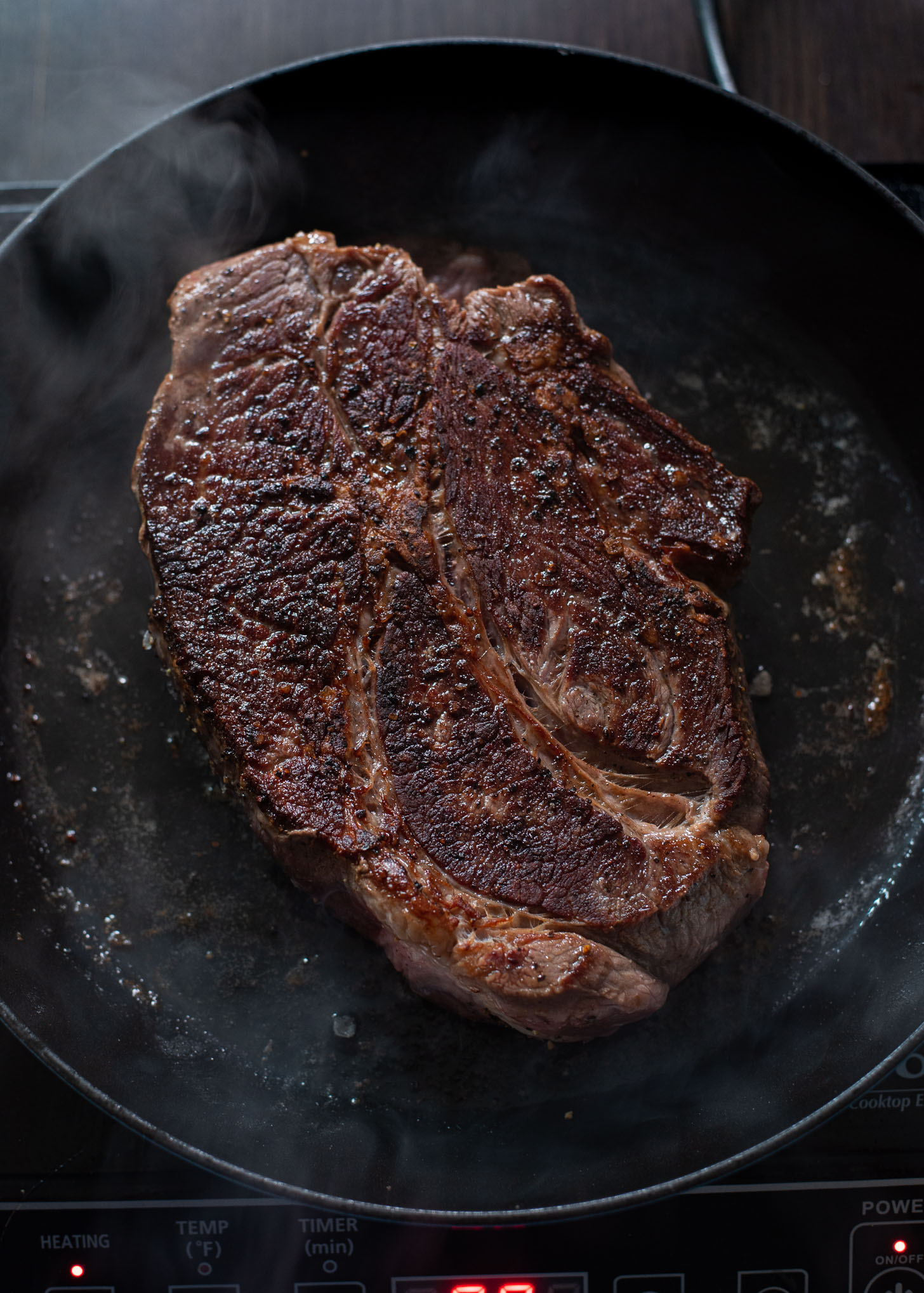 Seared beef chuck is showing well caramelized surface on top.