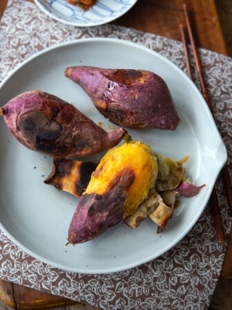 Pan roasted Korean sweet potato is peeled and shows the caramelization in the flesh.
