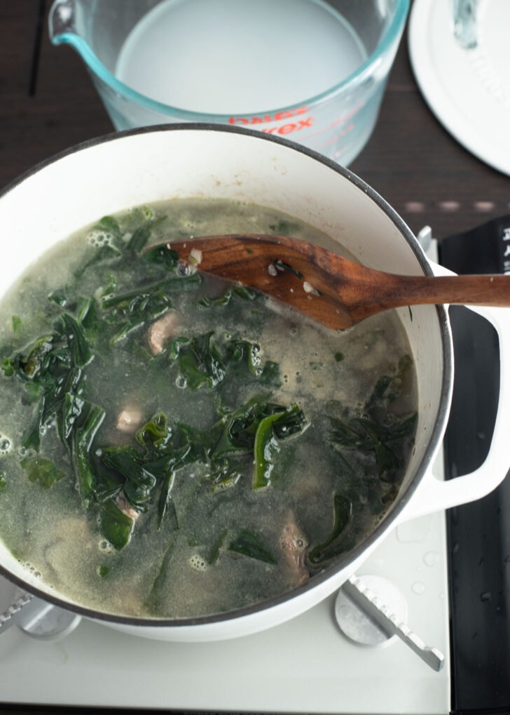 A pot of miyuk-guk (seaweed soup)simmering in a pot.