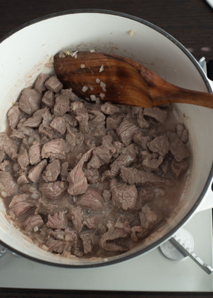 Browned beef in a pot.