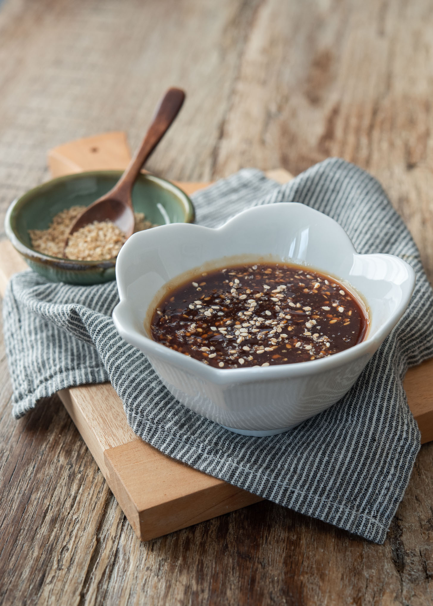 Homemade tonkatsu sauce is combined with crushed toasted sesame seeds.