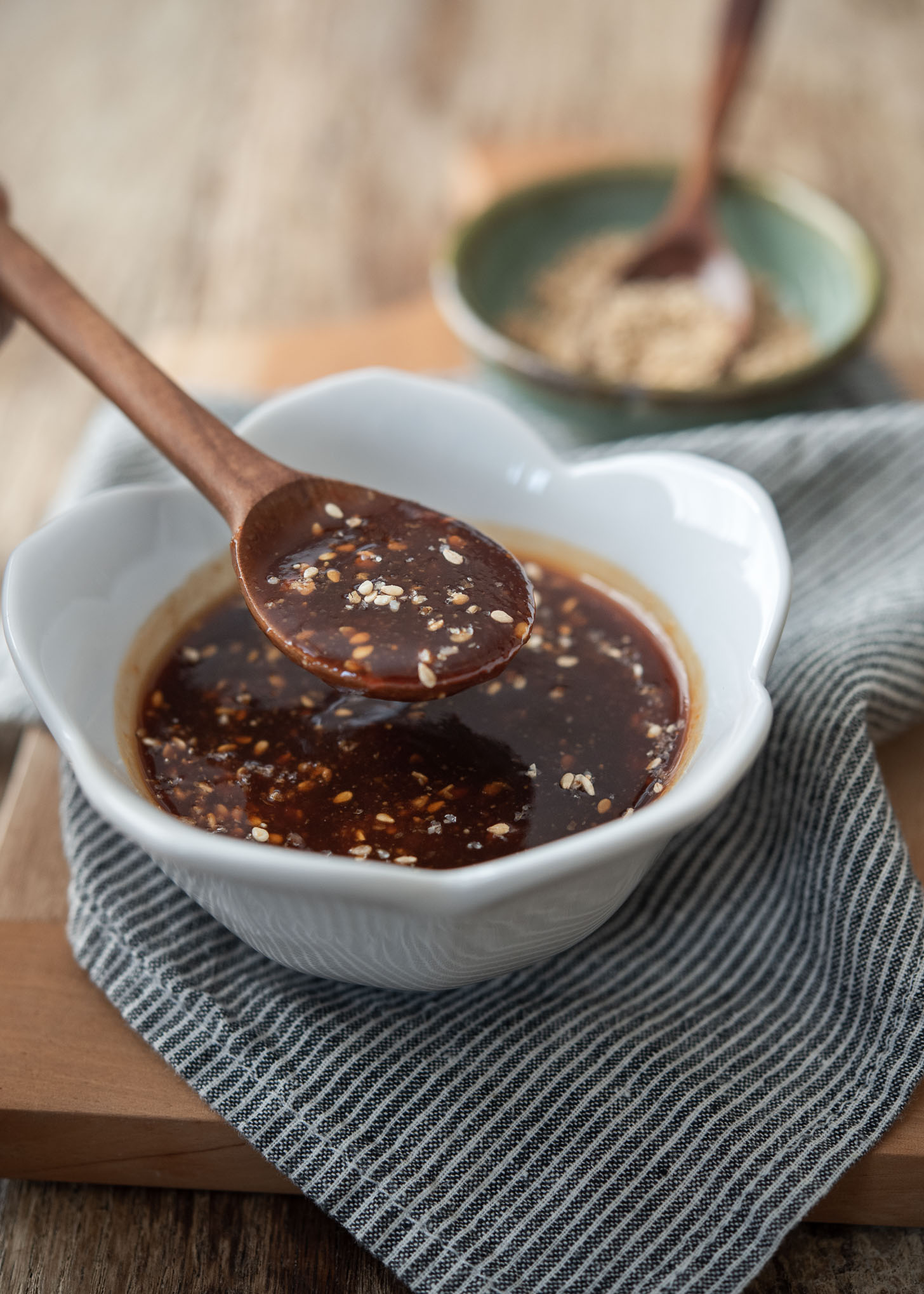 Tonkatsu sauce combined with crushed sesame seeds in a small bowl.