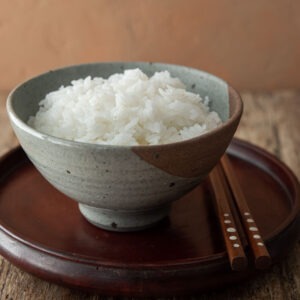 A bowl of perfectly cooked Korean short grain white rice is presented.