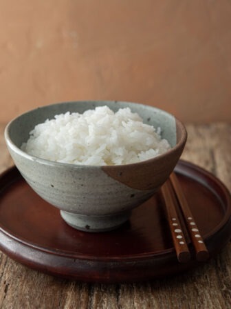 A bowl of perfectly cooked Korean short grain white rice is presented.