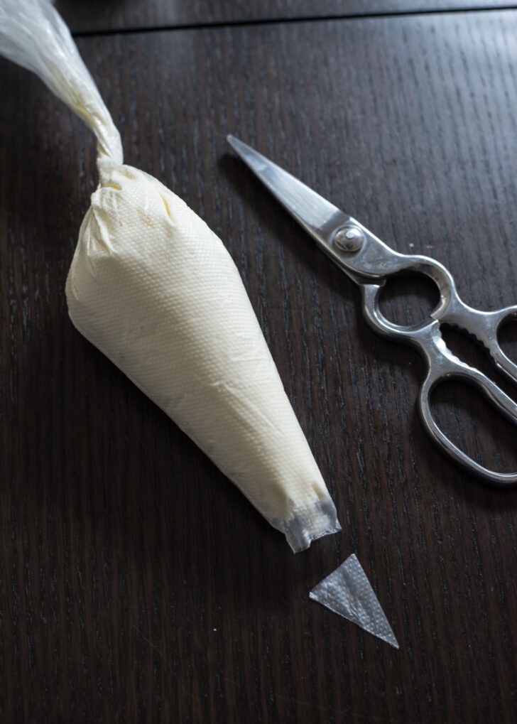 Cream cheese filling inside a pastry bag.