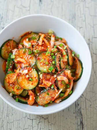 A top view of Korean cucumber salad in a bowl.